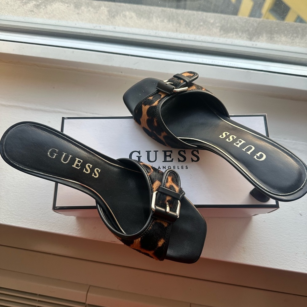 Guess Leopard-Print Buckle Mules in Black and Brown